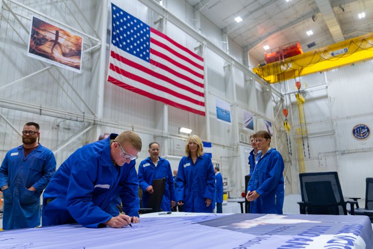 Vice Admiral Johnny R. Wolfe, director of strategic systems programs, U.S. Navy, signs a Trident II D5 Banner in a manufacturing facility where the systems solid rocket propulsion is built. (Photo Credit: Northrop Grumman) Northrop Grumman Manufactures Two Thousandth Solid Rocket Motor for US Navy's Trident II D5 Program